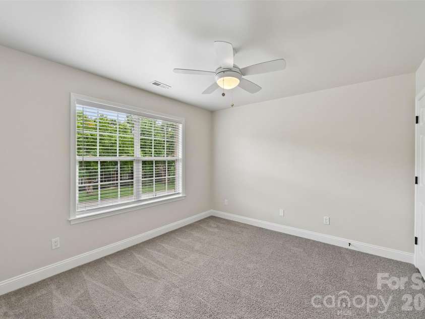 2825 Chip Shot Drive, Matthews, NC 28104.  MLS# CAR4388155, YatesRealty ID 27473. 