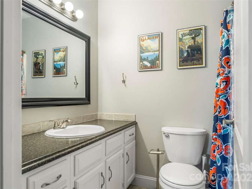 4 Northview Lane, Weaverville, NC 28787.  MLS# CAR4278075, YatesRealty ID 27473. Lower level bathroom