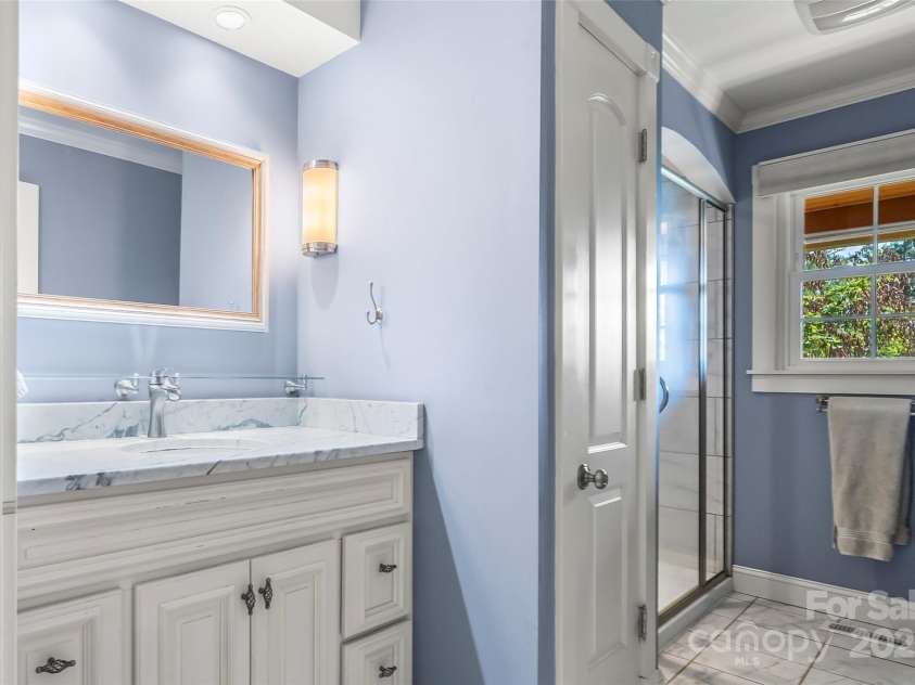 4 Northview Lane, Weaverville, NC 28787.  MLS# CAR4278075, YatesRealty ID 27473. Main level bathroom