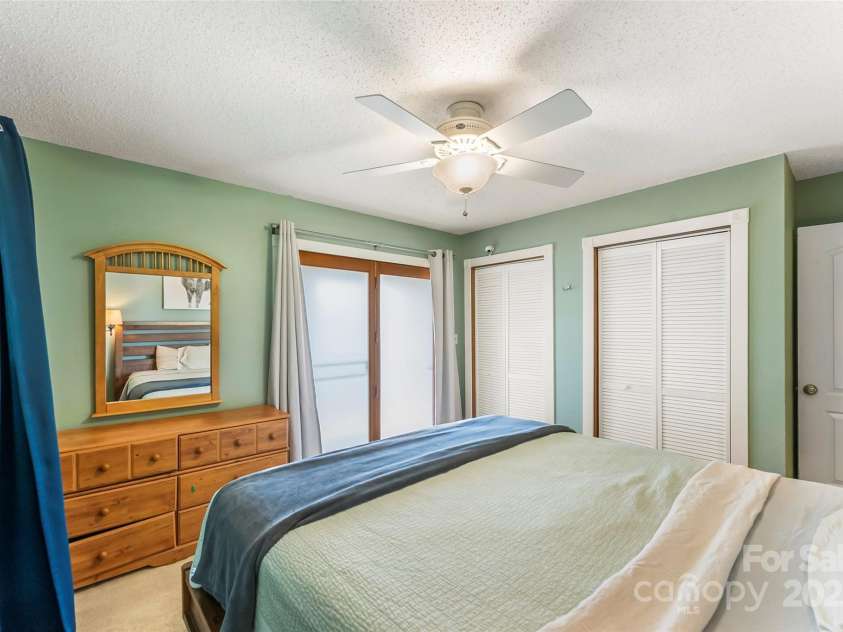 4 Northview Lane, Weaverville, NC 28787.  MLS# CAR4278075, YatesRealty ID 27473. Primary with double closets and doors to back porch