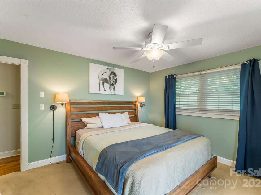 4 Northview Lane, Weaverville, NC 28787.  MLS# CAR4278075, YatesRealty ID 27473. Primary with double closets and doors to back porch