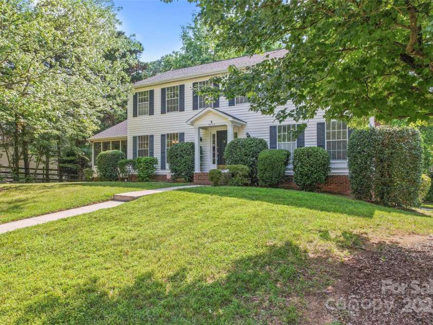 9833 White Cascade Drive, Charlotte, NC 28269.  MLS# CAR4275187, YatesRealty ID 27475. Exterior front