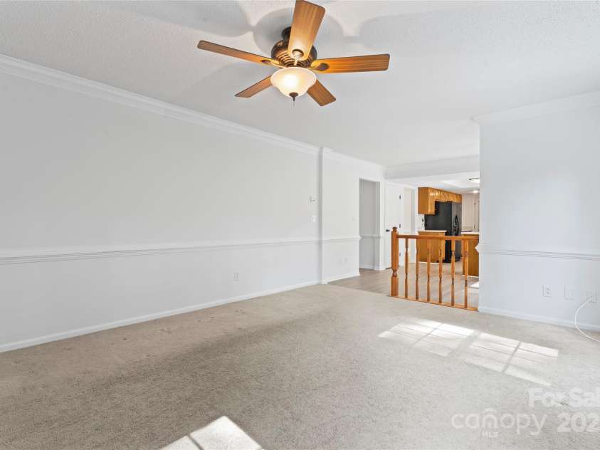 9833 White Cascade Drive, Charlotte, NC 28269.  MLS# CAR4275187, YatesRealty ID 27475. Family room