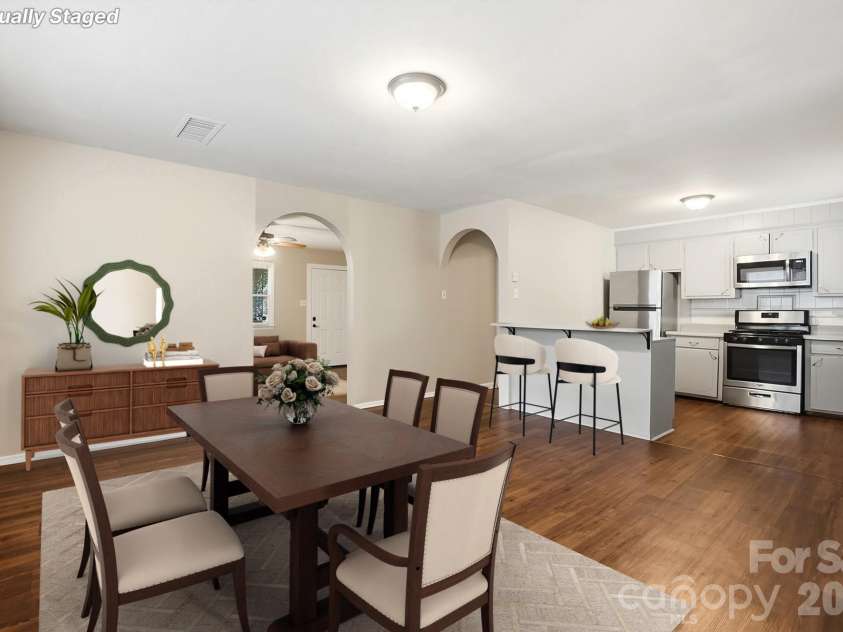 6308 Covecreek Drive, Charlotte, NC 28215.  MLS# CAR4386365, YatesRealty ID 27477. Dining into Kitchen / Virtually Staged