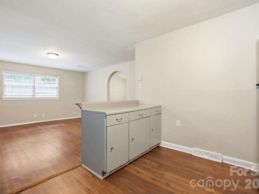 6308 Covecreek Drive, Charlotte, NC 28215.  MLS# CAR4386365, YatesRealty ID 27477. Kitchen into Dining