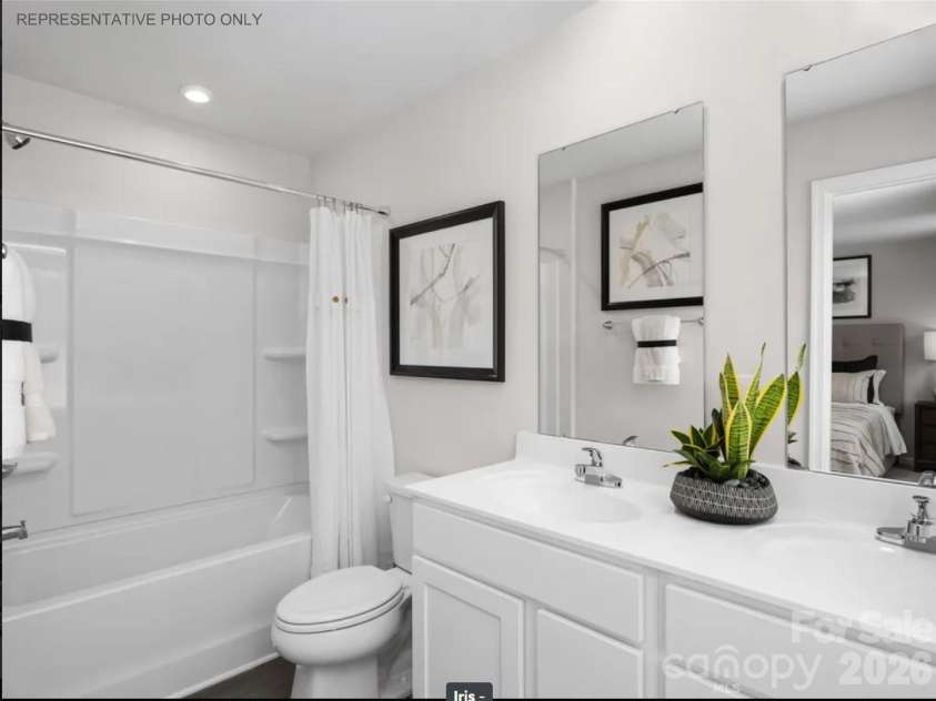 5414 McCallum Meadows Drive, Charlotte, NC 28216.  MLS# CAR4389264, YatesRealty ID 27482. Representative Photo Only