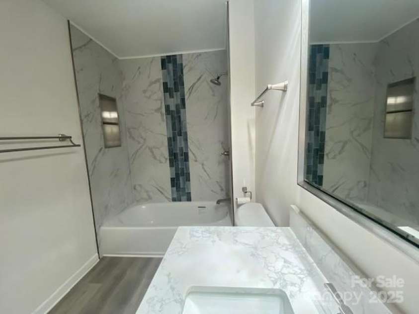 709 Falls Church Road, Charlotte, NC 28270.  MLS# CAR4275080, YatesRealty ID 27488. Bath 1, Checkout waterfall in bath
