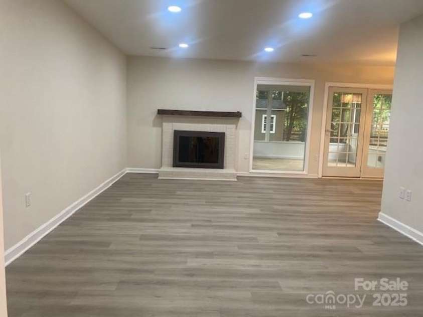 709 Falls Church Road, Charlotte, NC 28270.  MLS# CAR4275080, YatesRealty ID 27488. Great Room with Gas Fireplace. Recessed lighting with dimmer