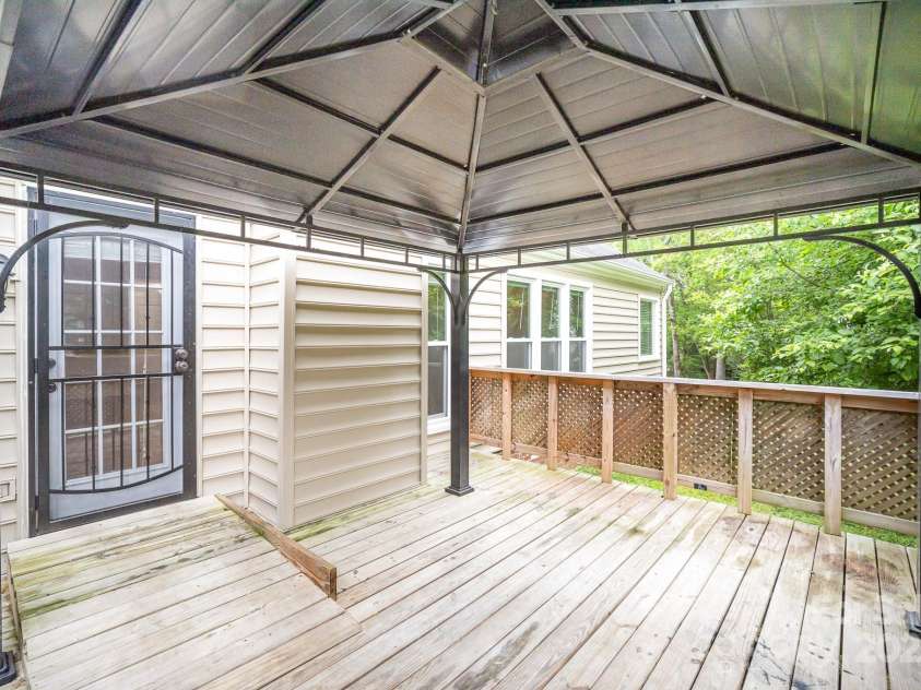 7106 Kinsmore Lane, Charlotte, NC 28269.  MLS# CAR4250943, YatesRealty ID 27491. Back deck