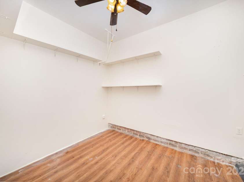 7106 Kinsmore Lane, Charlotte, NC 28269.  MLS# CAR4250943, YatesRealty ID 27491. Room inside garage