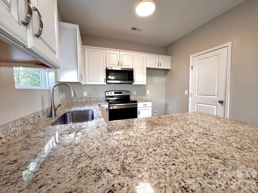 207 Freedom Drive, Albemarle, NC 28001.  MLS# CAR4389545, YatesRealty ID 27492. 