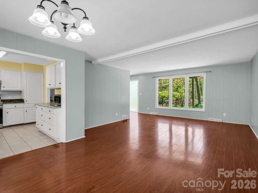 31 Firefly Lane, Saluda, NC 28773.  MLS# CAR4370921, YatesRealty ID 27498. Kitchen open to Family/Dining areas