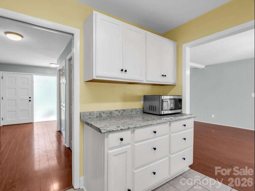 31 Firefly Lane, Saluda, NC 28773.  MLS# CAR4370921, YatesRealty ID 27498. Kitchen open to Foyer and Dining