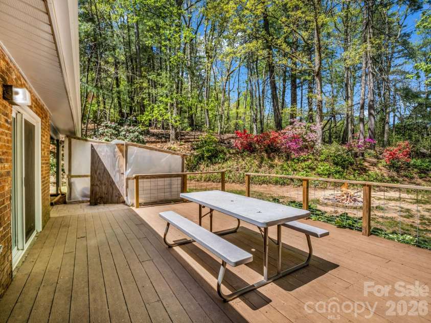 31 Firefly Lane, Saluda, NC 28773.  MLS# CAR4370921, YatesRealty ID 27498. Large Deck to Backyard