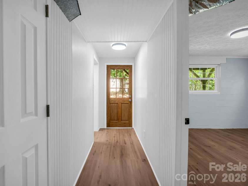 31 Firefly Lane, Saluda, NC 28773.  MLS# CAR4370921, YatesRealty ID 27498. Lower Level access to backyard