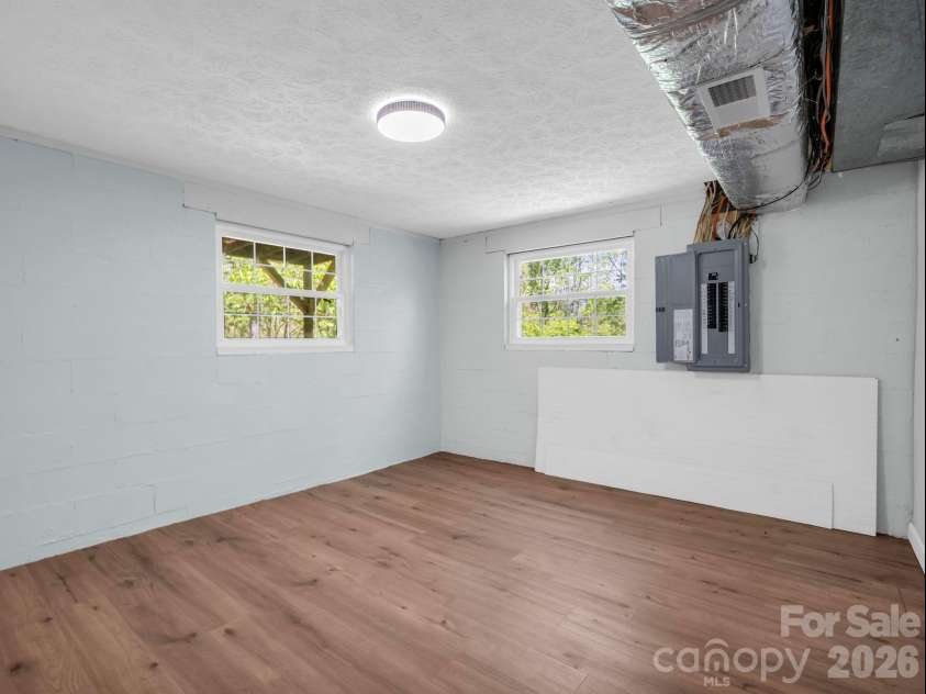 31 Firefly Lane, Saluda, NC 28773.  MLS# CAR4370921, YatesRealty ID 27498. Lower Level Flex Space