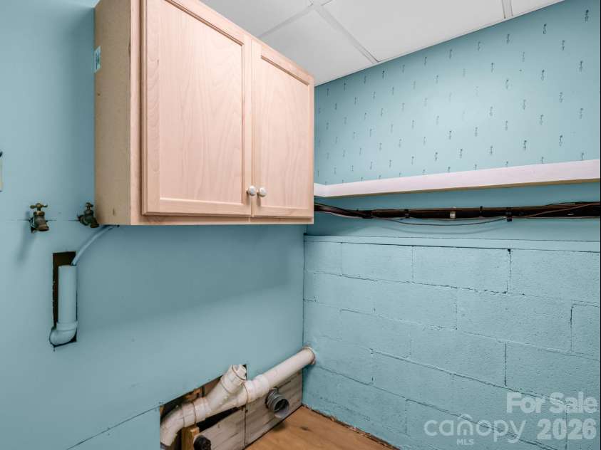 31 Firefly Lane, Saluda, NC 28773.  MLS# CAR4370921, YatesRealty ID 27498. Lower Level Laundry Space