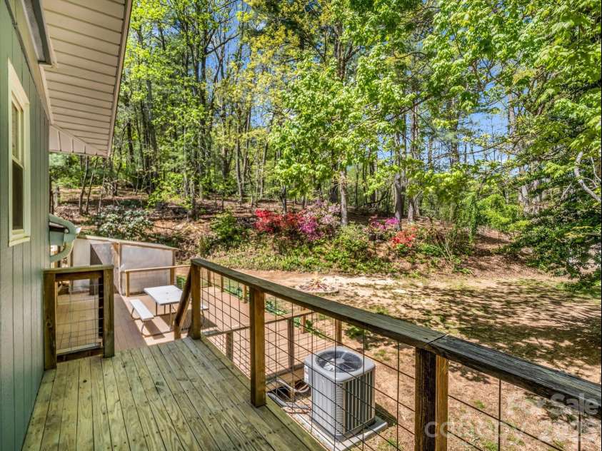 31 Firefly Lane, Saluda, NC 28773.  MLS# CAR4370921, YatesRealty ID 27498. Main Bedroom deck