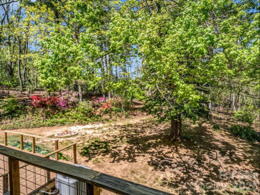 31 Firefly Lane, Saluda, NC 28773.  MLS# CAR4370921, YatesRealty ID 27498. Mature lanscape