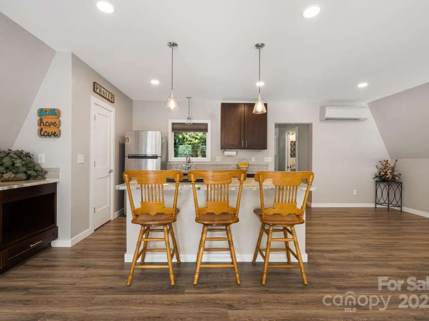 1101 Line Runner Ridge Road, Rosman, NC 28772.  MLS# CAR4280963, YatesRealty ID 27502. Kitchen island seating