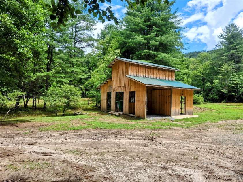 1101 Line Runner Ridge Road, Rosman, NC 28772.  MLS# CAR4280963, YatesRealty ID 27502. You are greeted by a lovely barn as you enter you property