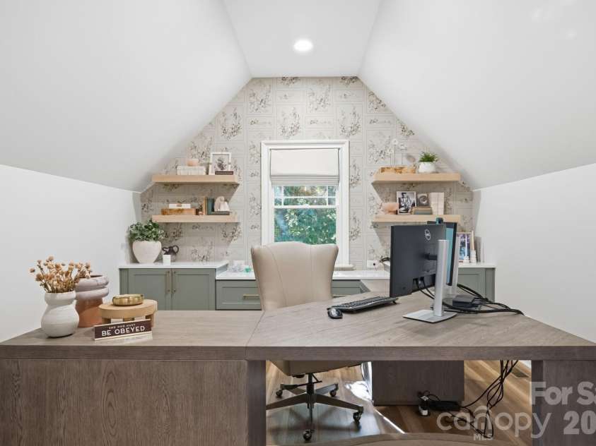 9717 Lancaster Highway, Waxhaw, NC 28173.  MLS# CAR4371188, YatesRealty ID 27507. Built in desk, floating cabinets