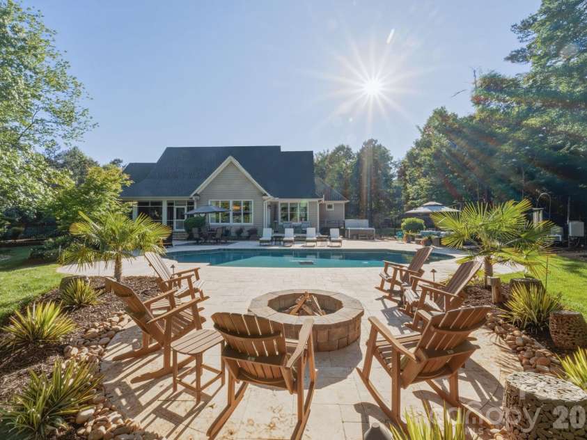 9717 Lancaster Highway, Waxhaw, NC 28173.  MLS# CAR4371188, YatesRealty ID 27507. Evenings around the fire pit