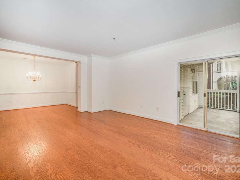 5617 Fairview Road, Charlotte, NC 28209.  MLS# CAR4315083, YatesRealty ID 27510. Family Room Opens Onto Patio