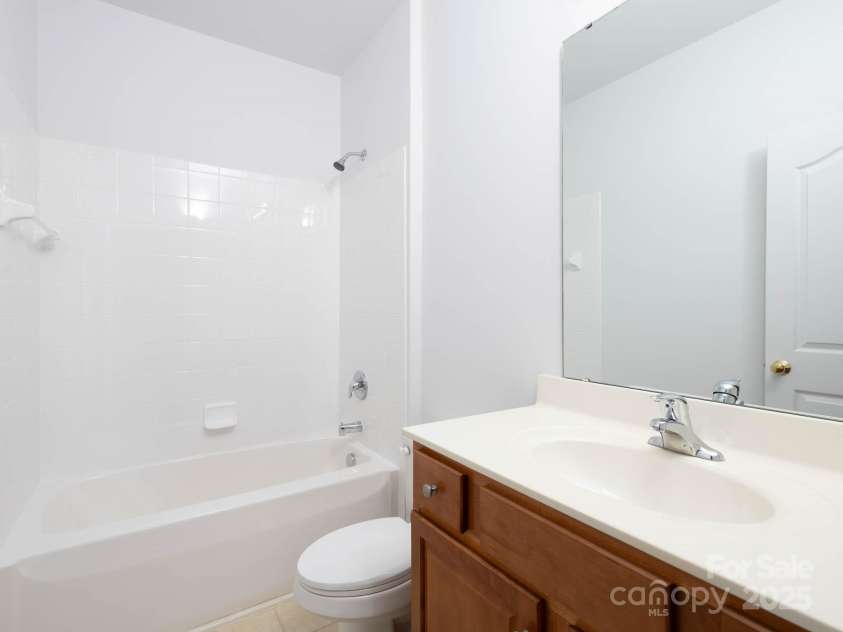 17119 Doe Valley Court, Cornelius, NC 28031.  MLS# CAR4263849, YatesRealty ID 27519. Second bathroom has tub