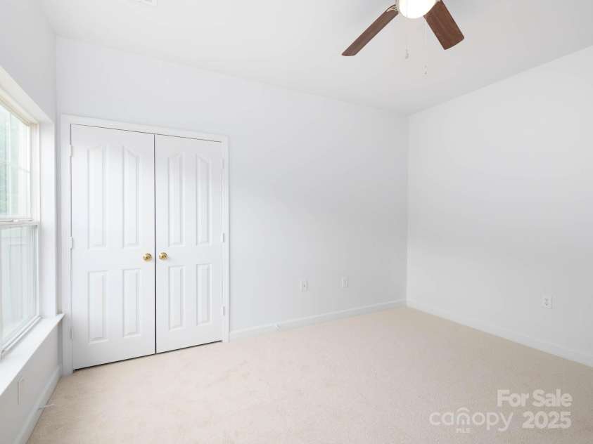 17119 Doe Valley Court, Cornelius, NC 28031.  MLS# CAR4263849, YatesRealty ID 27519. Secondary bedroom is spacious and next to the flex room