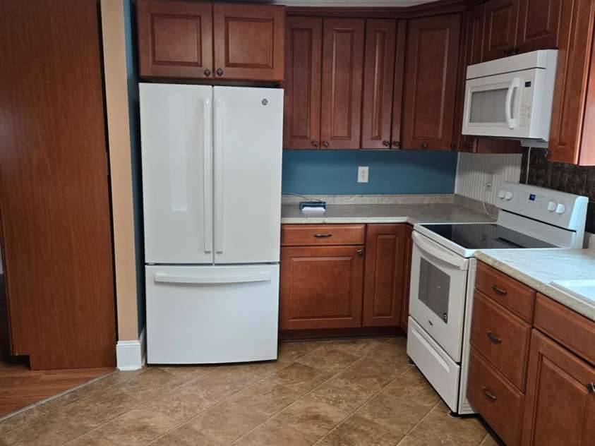 1407 College Avenue, Newton, NC 28658.  MLS# CAR4388178, YatesRealty ID 27524. New refrigerator with ice maker.