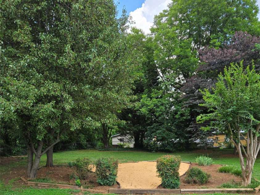 1407 College Avenue, Newton, NC 28658.  MLS# CAR4388178, YatesRealty ID 27524. Nice back year
