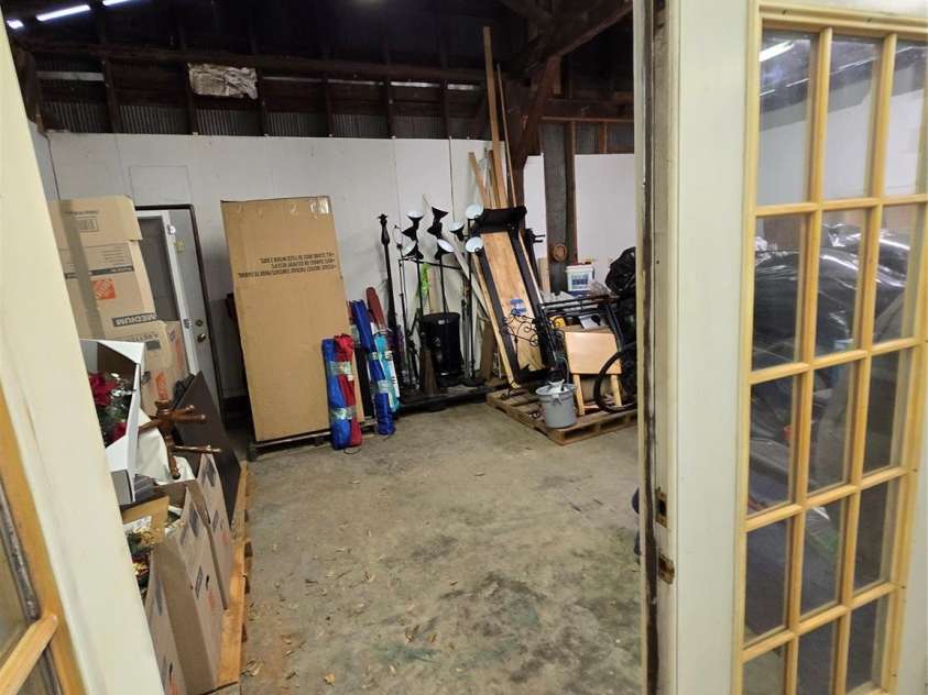 1407 College Avenue, Newton, NC 28658.  MLS# CAR4388178, YatesRealty ID 27524. Workshop or extra storage in Garage