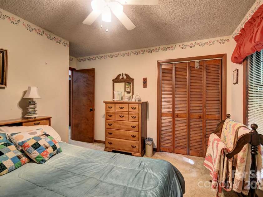 501 Locust Grove Drive, Waynesville, NC 28785.  MLS# CAR4282099, YatesRealty ID 27527. Alternate photo of bedroom 2