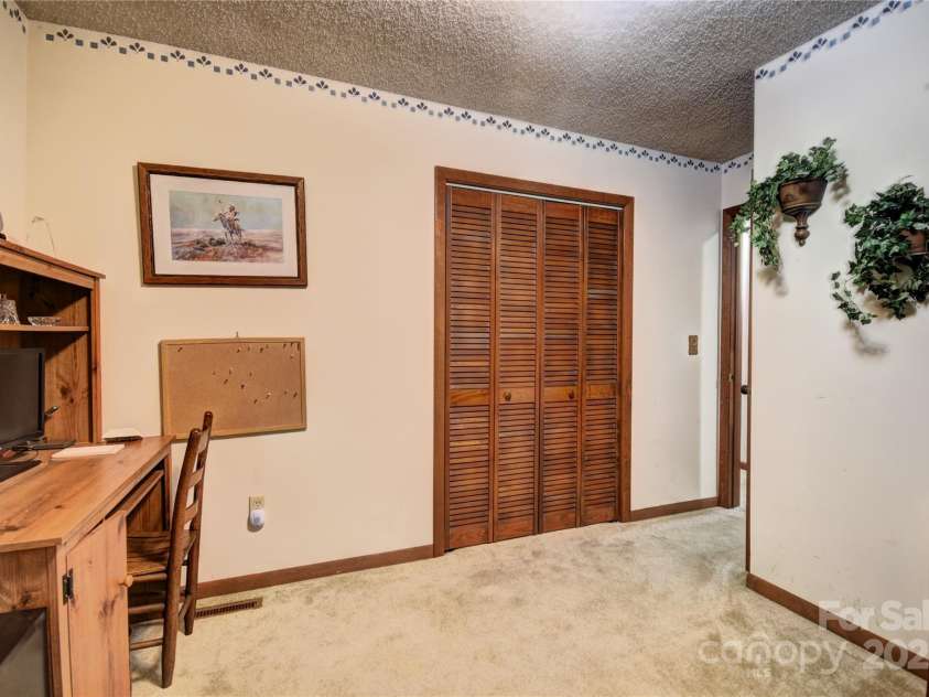 501 Locust Grove Drive, Waynesville, NC 28785.  MLS# CAR4282099, YatesRealty ID 27527. Alternate Photo of the office/bonus room