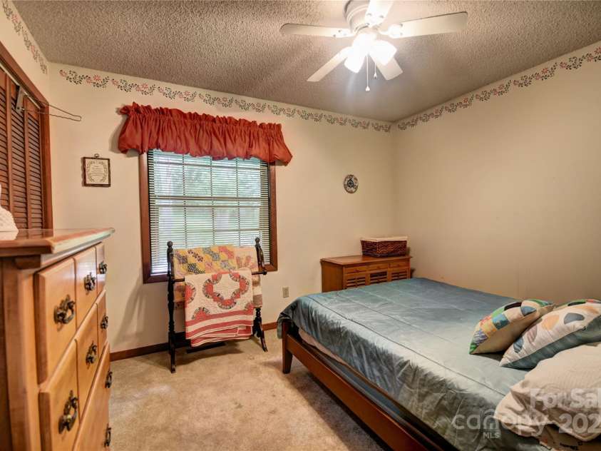 501 Locust Grove Drive, Waynesville, NC 28785.  MLS# CAR4282099, YatesRealty ID 27527. Bedroom 2