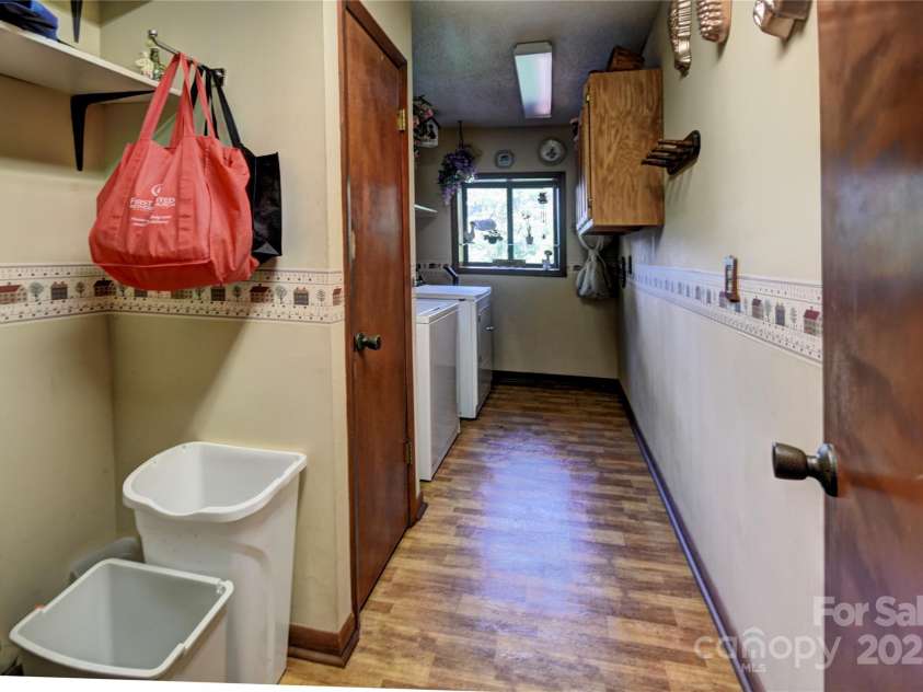 501 Locust Grove Drive, Waynesville, NC 28785.  MLS# CAR4282099, YatesRealty ID 27527. Laundry Room