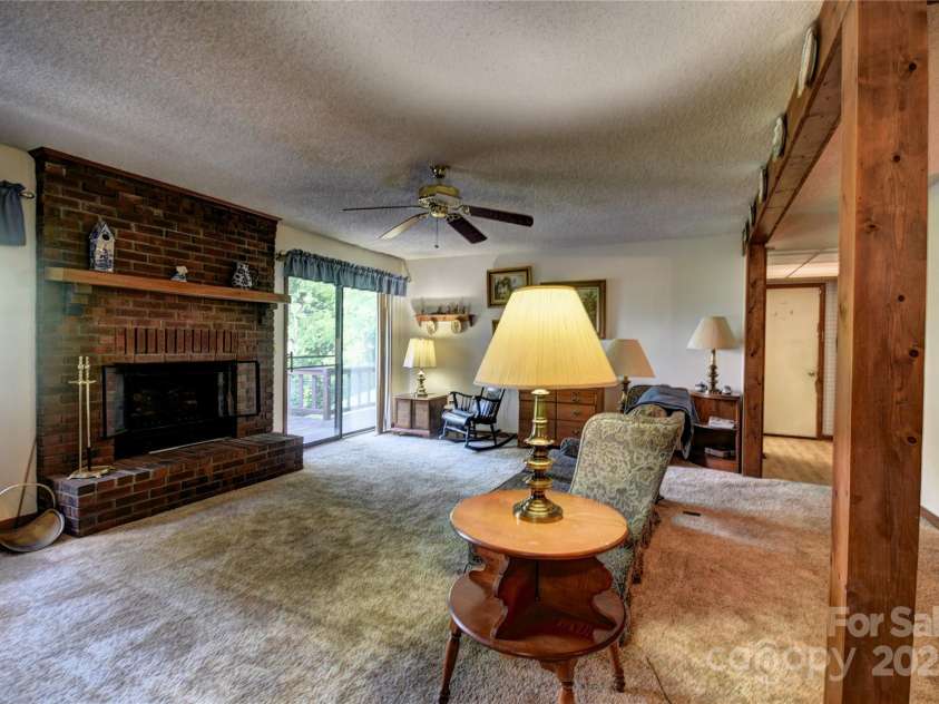 501 Locust Grove Drive, Waynesville, NC 28785.  MLS# CAR4282099, YatesRealty ID 27527. Living Area of the great room