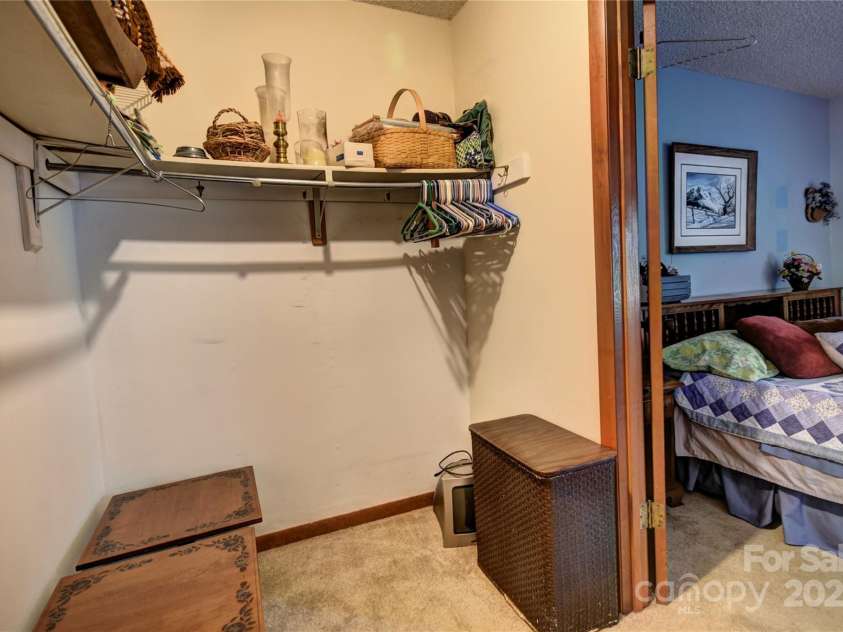 501 Locust Grove Drive, Waynesville, NC 28785.  MLS# CAR4282099, YatesRealty ID 27527. Walk-In Closet off the primary bedroom
