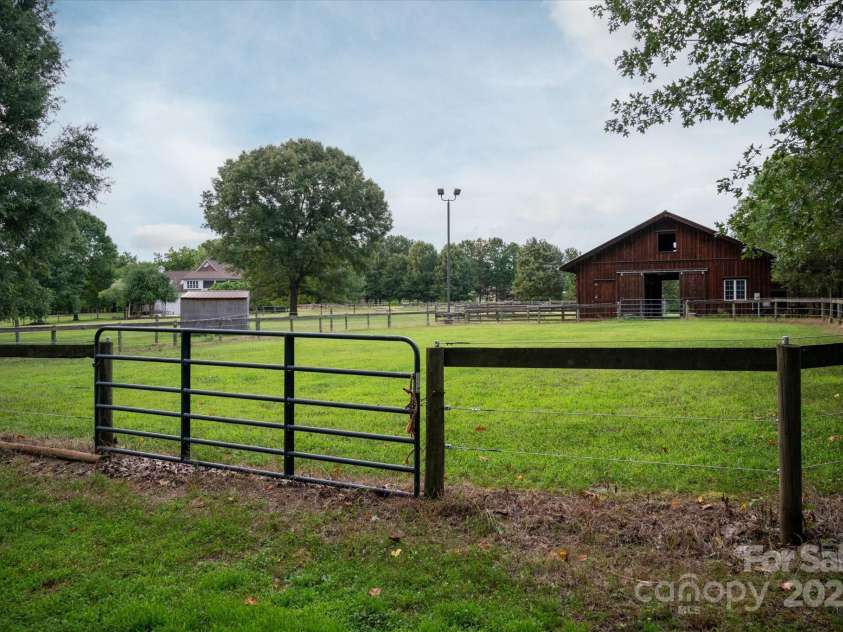 6325 Pleasant Grove Road, Waxhaw, NC 28173.  MLS# CAR4262847, YatesRealty ID 27530. 