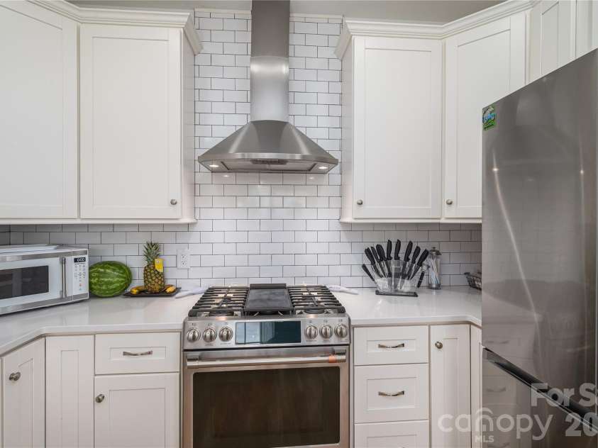 2725 Eagle Drive, Lincolnton, NC 28092.  MLS# CAR4387152, YatesRealty ID 27532. Culinary Kitchen includes hood vent, gas stove, upgraded fridge