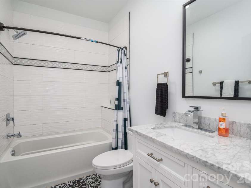 2725 Eagle Drive, Lincolnton, NC 28092.  MLS# CAR4387152, YatesRealty ID 27532. Guest Bathroom with custom tile shower