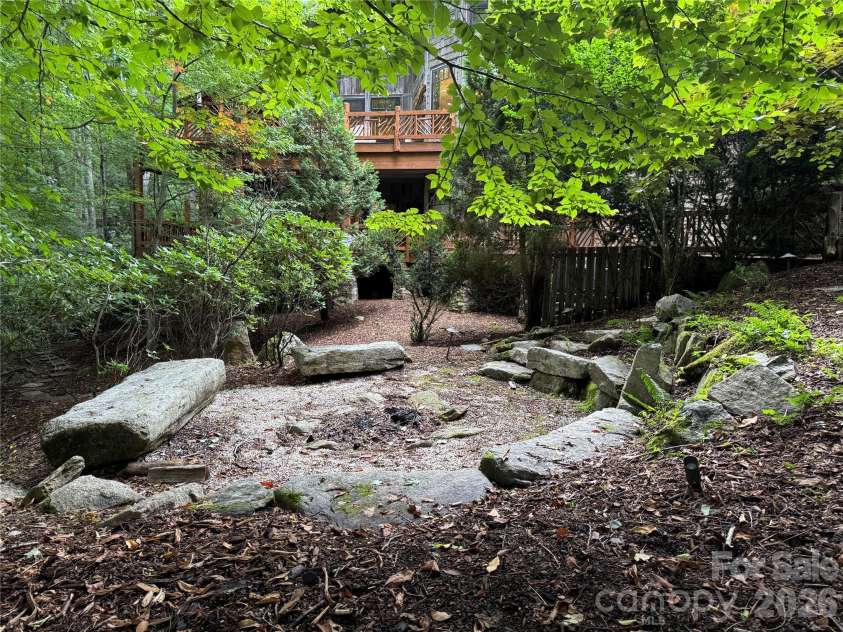 355 Oakley Green None, Boone, NC 28607.  MLS# CAR4382416, YatesRealty ID 27534. Firepit area