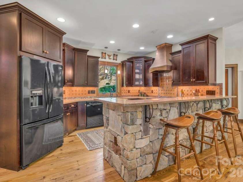 355 Oakley Green None, Boone, NC 28607.  MLS# CAR4382416, YatesRealty ID 27534. Kitchen with bar seating