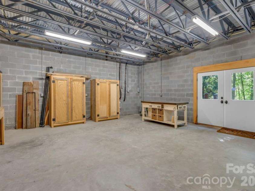 355 Oakley Green None, Boone, NC 28607.  MLS# CAR4382416, YatesRealty ID 27534. Lower-level workshop