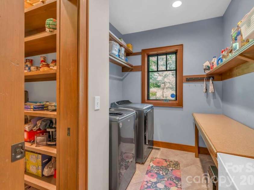 355 Oakley Green None, Boone, NC 28607.  MLS# CAR4382416, YatesRealty ID 27534. Main-level pantry & laundry room