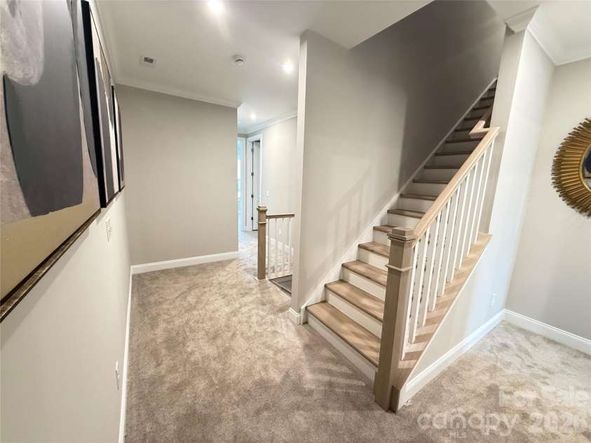 12046 Lavinia Lane, Charlotte, NC 28277.  MLS# CAR4280776, YatesRealty ID 27535. LVP Stairs to Third Floor