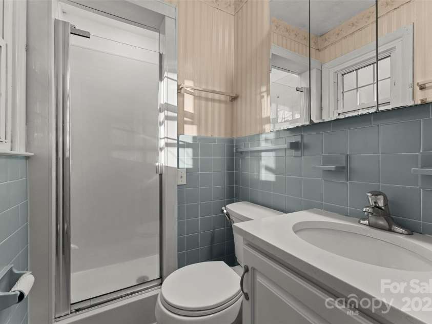 123 Castleton Lane, Hendersonville, NC 28791.  MLS# CAR4237756, YatesRealty ID 2754. Full bath w/ walk in shower 