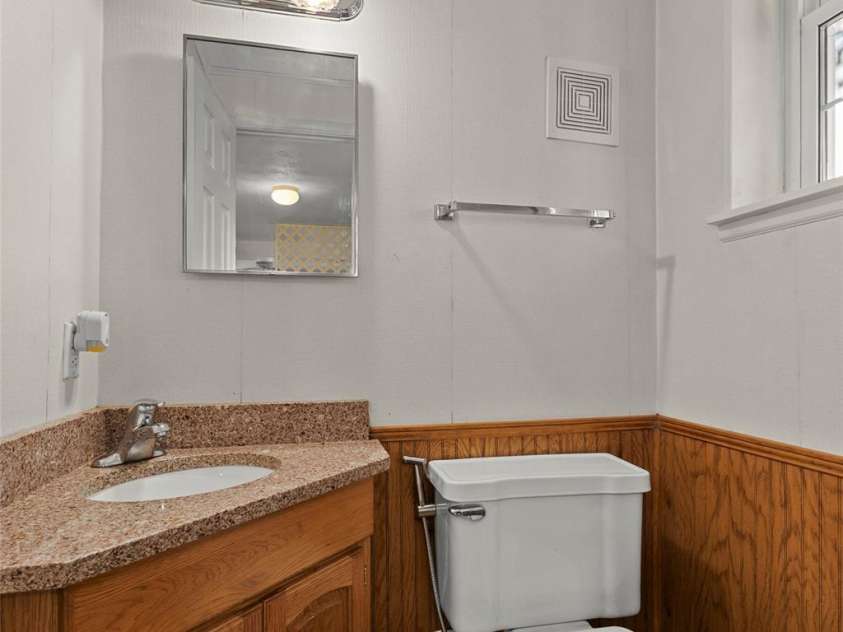 123 Castleton Lane, Hendersonville, NC 28791.  MLS# CAR4237756, YatesRealty ID 2754. Half Bath in Basement