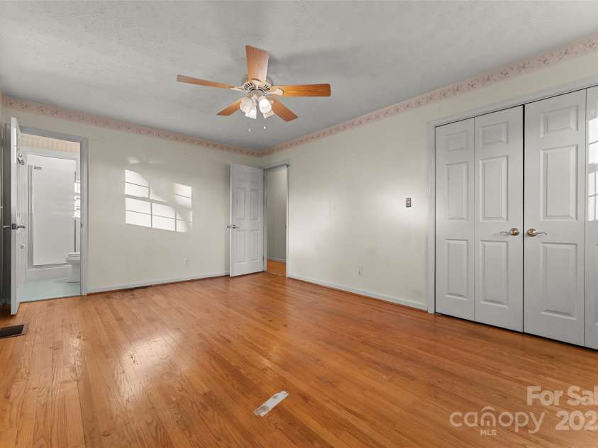 123 Castleton Lane, Hendersonville, NC 28791.  MLS# CAR4237756, YatesRealty ID 2754. Primary Bedroom w/ ensuite